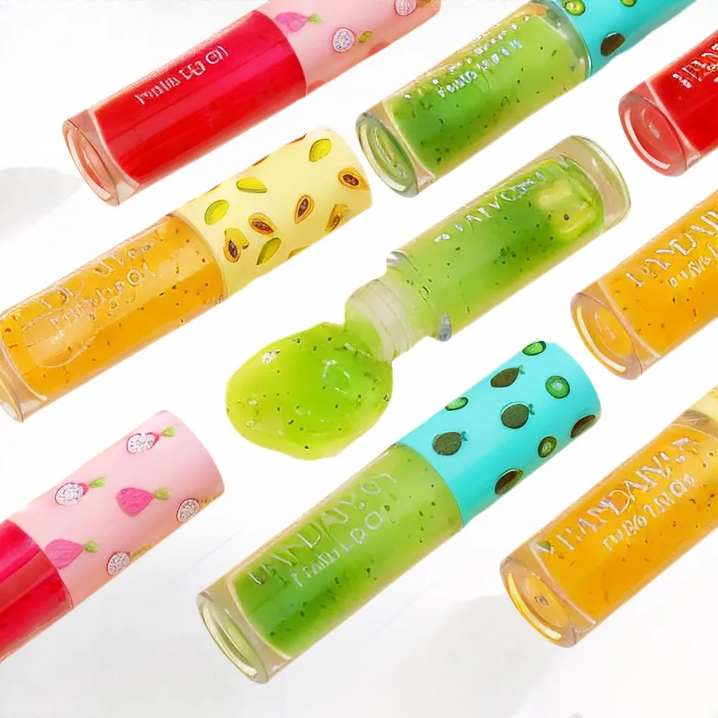 Fruit Series Lip Oil Gloss Lèvres en verre en vrac Hydratant Baume transparent éliminant la peau morte et la décoloration des lignes de peau Maquillage