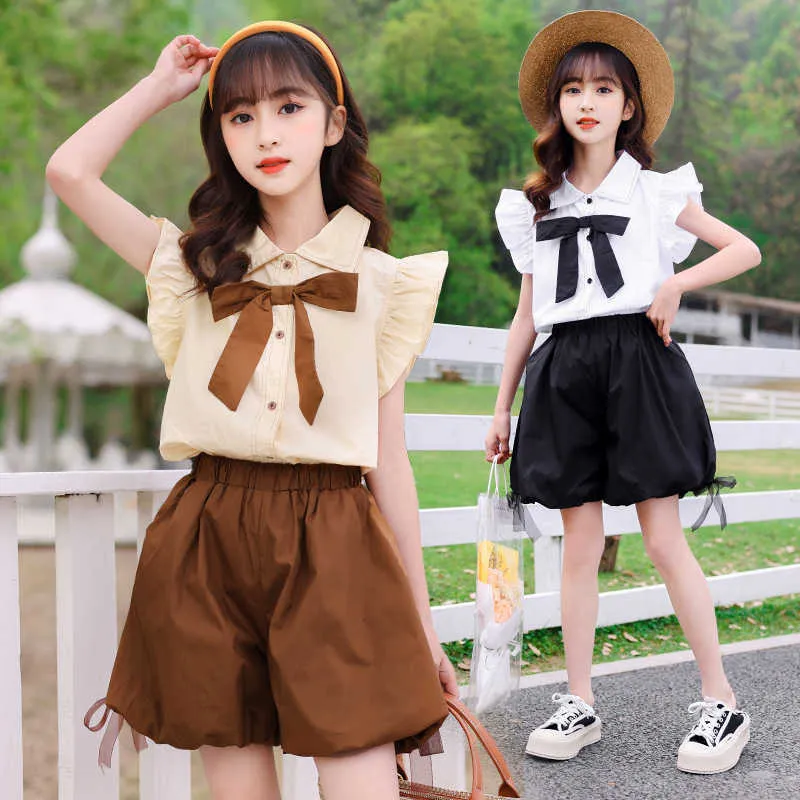 Summer Primary Kids Clothes Set Cute Bow Shirt And Shorts For Girls, Fly  Sleeve Outfit, Ages 6 12 AA230510 From Qiaomaidou04, $21.89