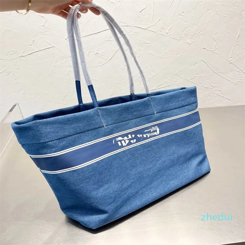 2023 Fashion Handbag Handheld One Counter Tote كبيرة الإناث أنثى سميكة الطالبة تخزين حقيبة تسوق بسيطة