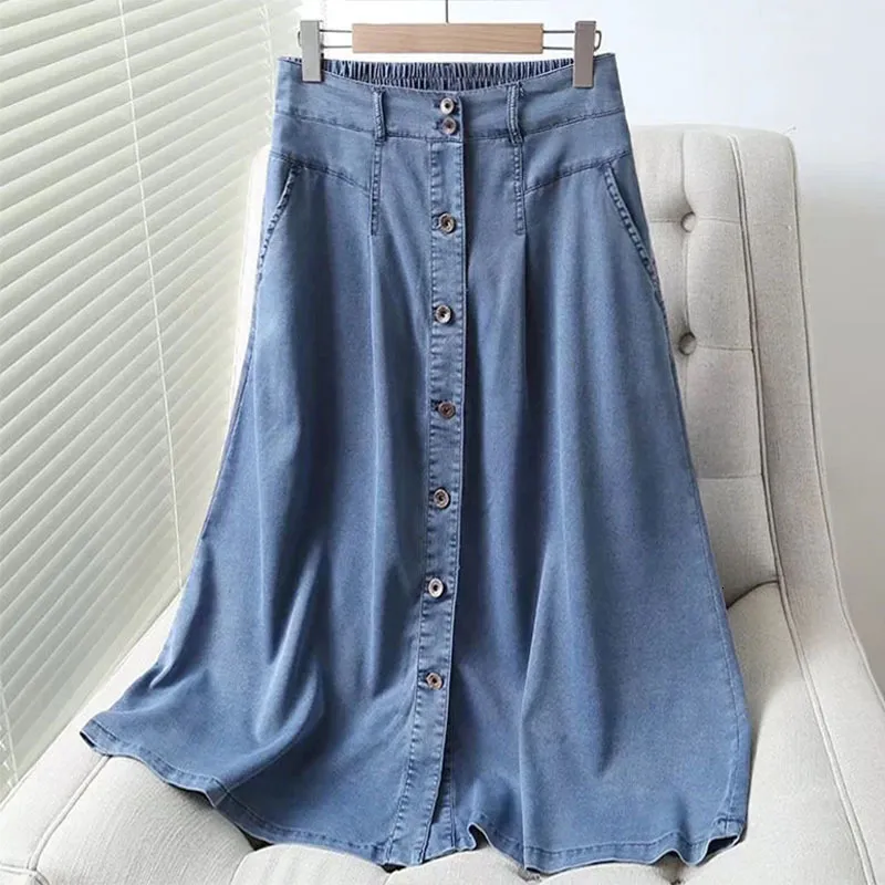 Skirts All-match Fashion Elastic Waist Long Skirts for Women Spring Solid Color Single Breasted Pockets Korean Style Denim Skirt 230511