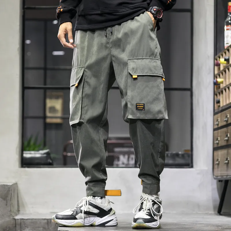 Pantaloni verdi cheap uomo con tasche