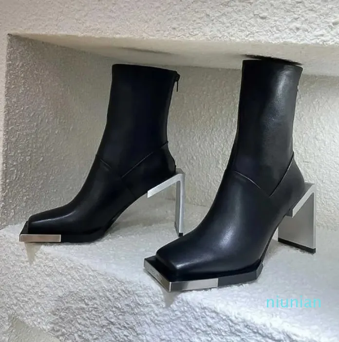 High heeled steel toe boots top