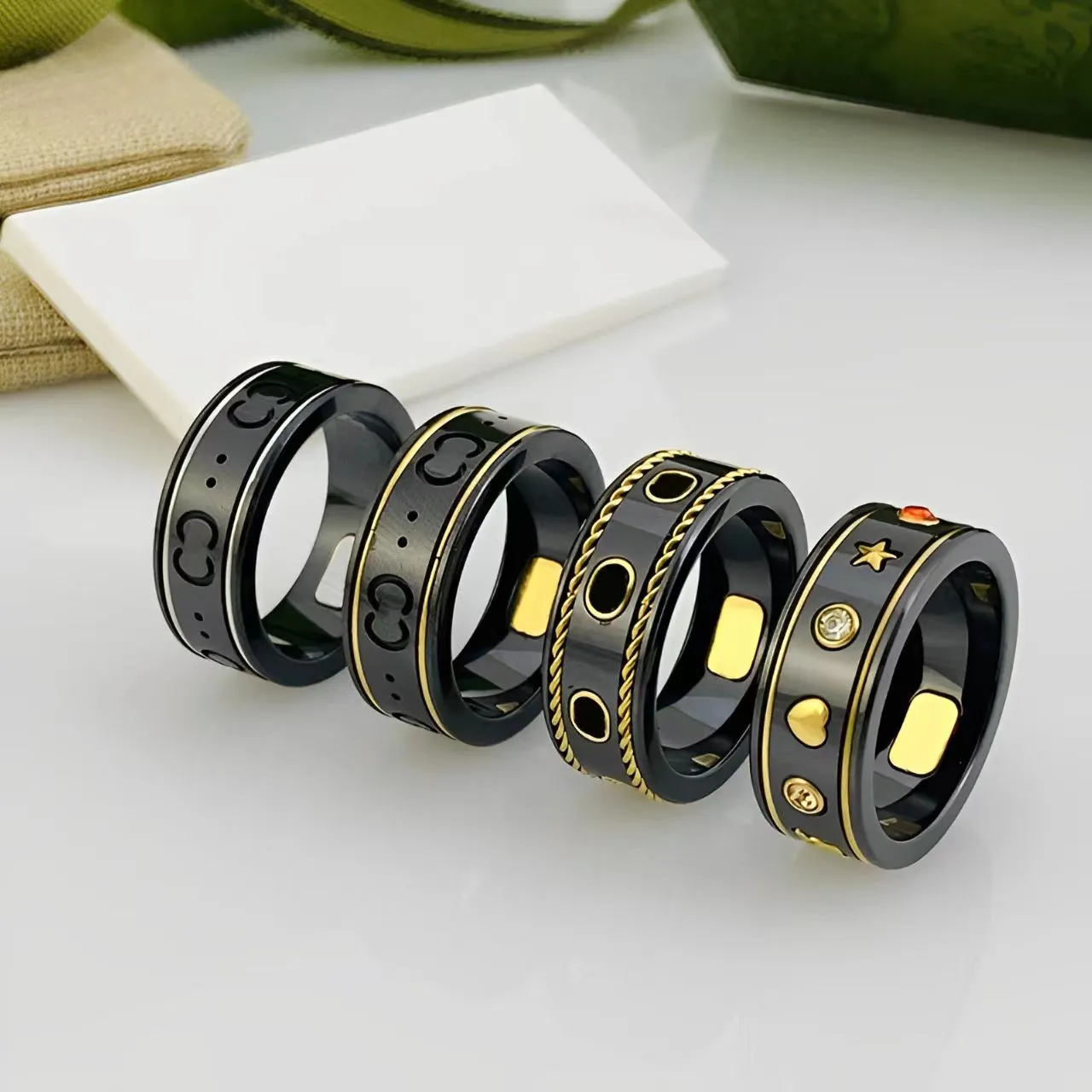 Anel de designer de luxo para homens e mulheres casal elegante g anel de amor de cerâmica de alta qualidade 18k anel de noivado de ouro