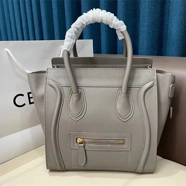 2size LUGGAGE Smiley Face Pochette Top Handle Bag Mirror Quality