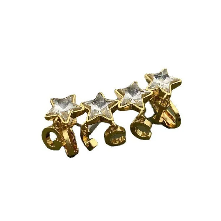 2023 nuovo arrivo orecchini di rame all'ingrosso 24k placcato oro gioielli di moda stella di lusso singolo orecchini a bottone clip dell'orecchio per le donne