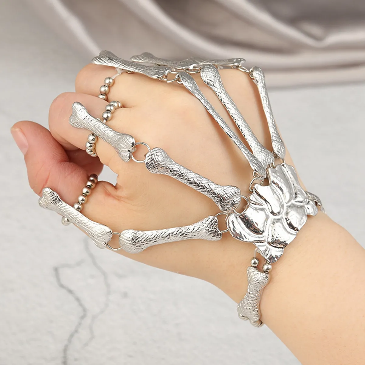 Metal skeleton hand bracelet online