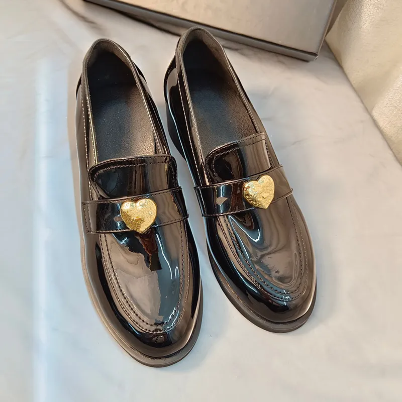 Black and gold designer loafers 2025