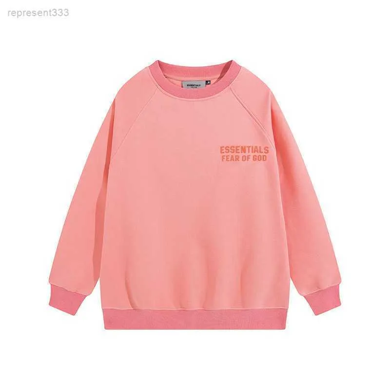 Fear of god essentials hoodie pink store