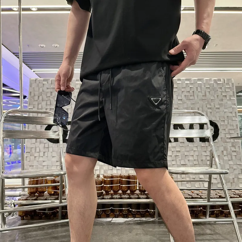 Дизайнерские мужские шорты Толстовки Баскетбольные шорты для мужчин Женские брюки Спортивные штаны Одежда Модная летняя пара для тренировок Пляжные дышащие брюки