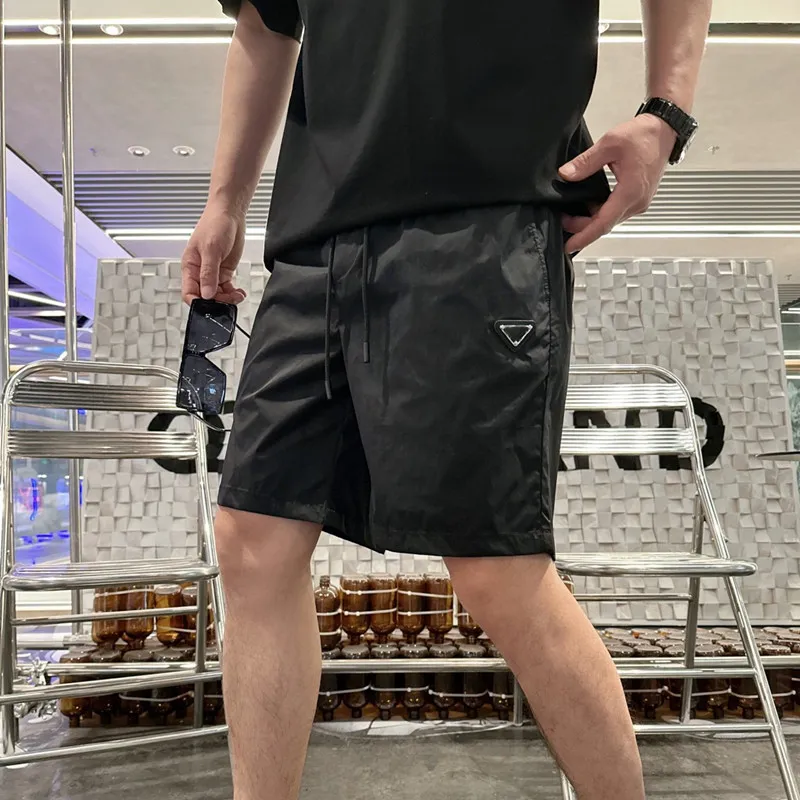 Designers mäns shorts tröjor basket kort för män kvinnor byxor svettbyxor kläder mode sommarpar träning strand andningsbyxor