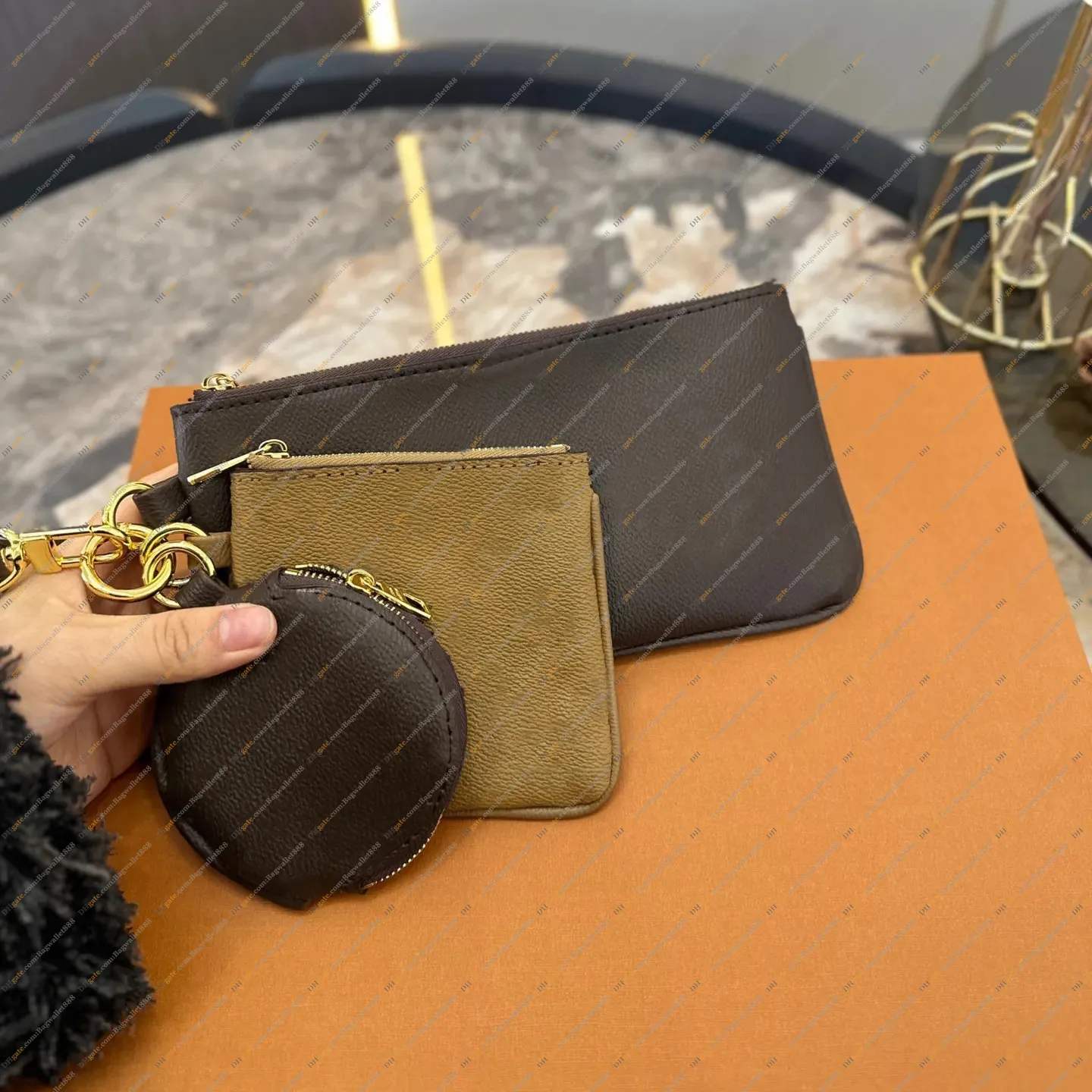Small designer coin purse hot sale