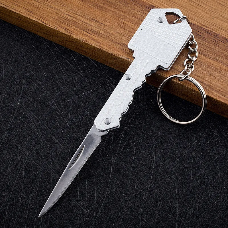 Mini coltello a pressione da tasca portatile portachiavi per autodifesa