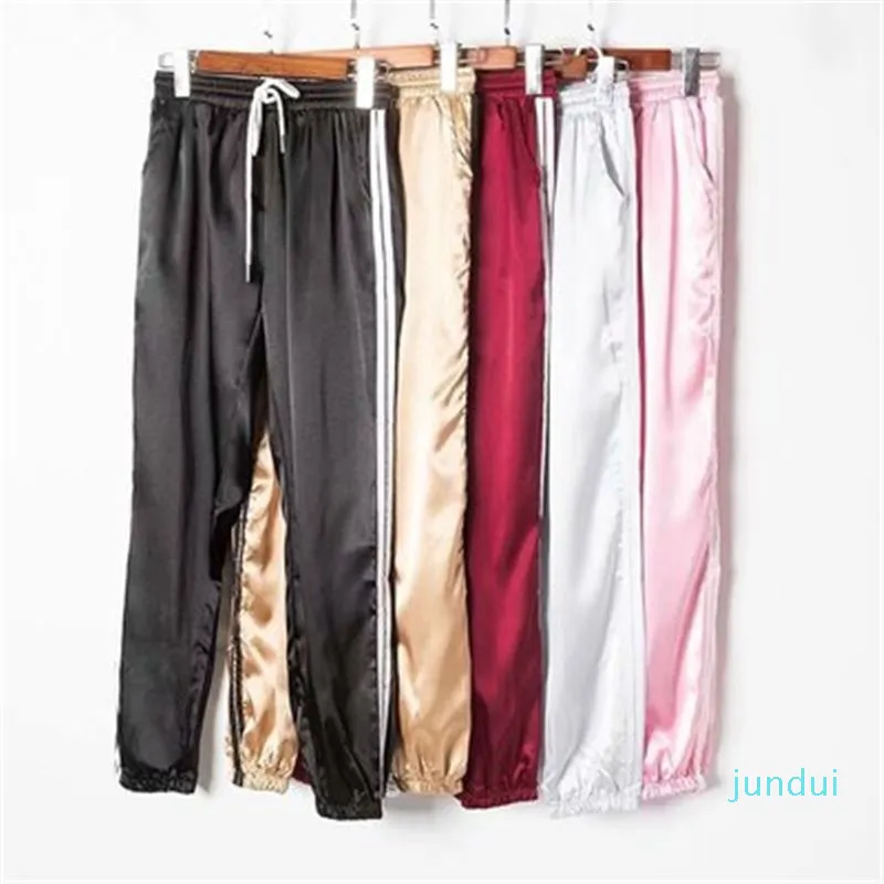 Fashion-female Summer Satin Pants Women أوروبا فضفاض عارضة الرياضة موضة ركض الشارع الشهير بنطلون طويل مصمم بنطلون