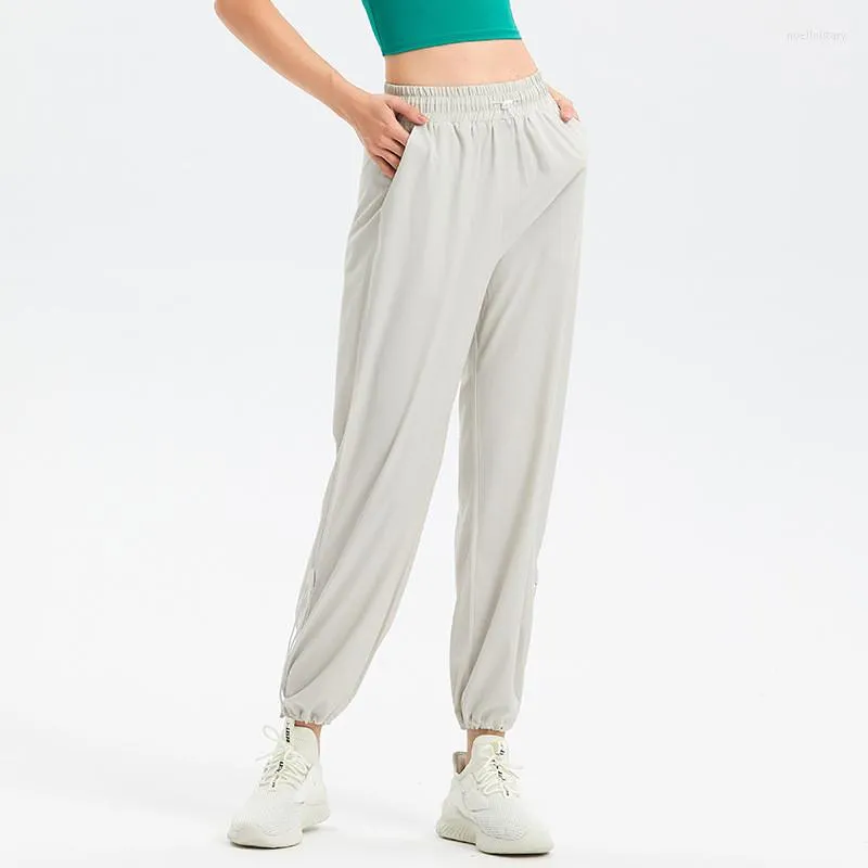 Pantaloni attivi 2023 Donna Palestra Allentato Fitness Tie Piedi Danza Yoga Pantaloni Tascabile Lettera Corsa Sport Harem Quick Dry Wear