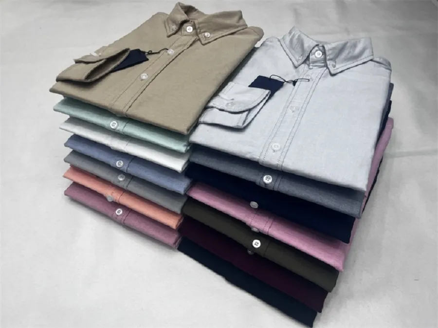 Polos de printemps et d'automne Coton Pure Coton Oxford Tourne à manches longues Couleur de mode à manches longues Couleur solide sans repassage à manches longues Men Hai