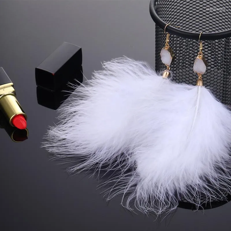 Boucles d'oreilles pendantes marque de mode européenne et américaine pour femme tempérament de luxe en peluche plume exagérée