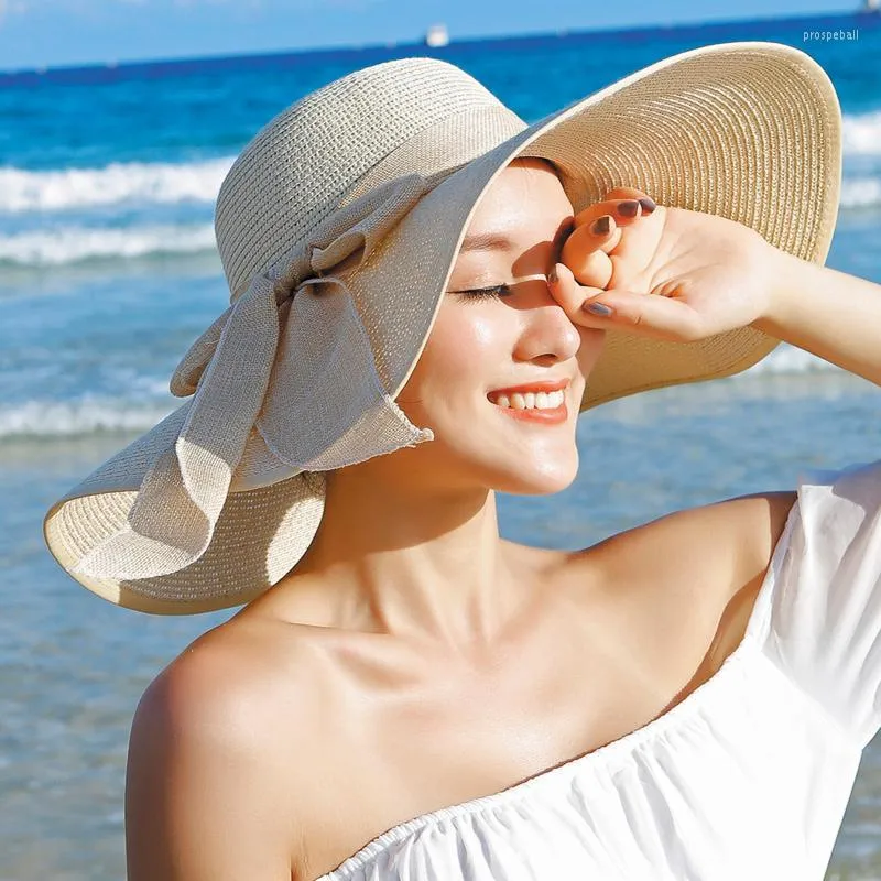 2023 Summer Womens Wide Brim Straw Hat With Bow With Bowknot Fashionable Floppy Anti UV Foldable Beach Sun Cap From Roycewhite 10 DHgate.Com
