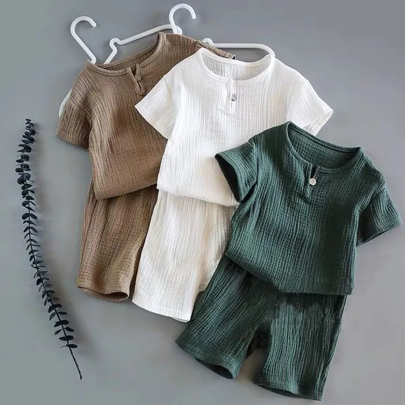 Set di abbigliamento Ragazzi Ragazze Abiti estivi Vestiti Baby Mussola Cotone Maniche corte Camicia Pantaloncini Tute Bambini TopPants Set 2 pezzi 0-8T 230516