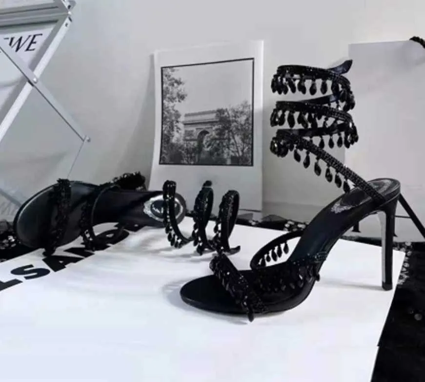 Hänge underbara sandaler lyxdesigner Rene Caovilla Crystal Light Wrapped Foot Ring Stiletto Bröllopsskor Top Quality Rhinestone High Heeled Gladiator SAH