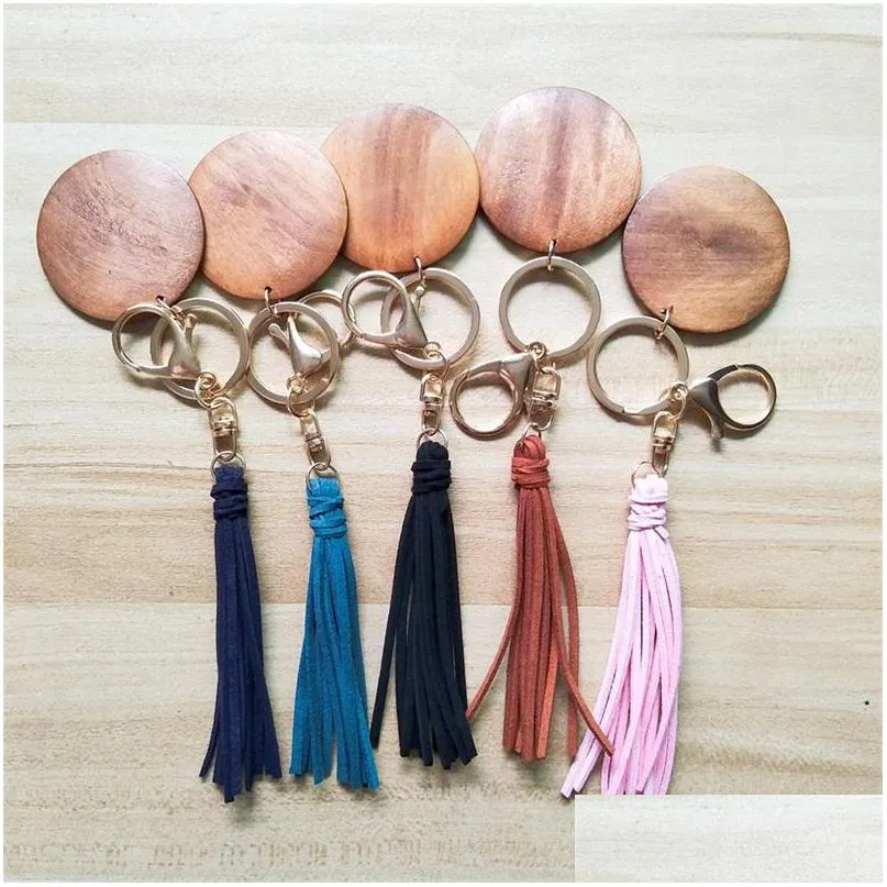 Nyckelringar 5 cm trä rund skiva nyckelring tasslar fast färg hängande ring enkelhet väskor smycken tillbehör för kvinnor och män 3 3t ott7d