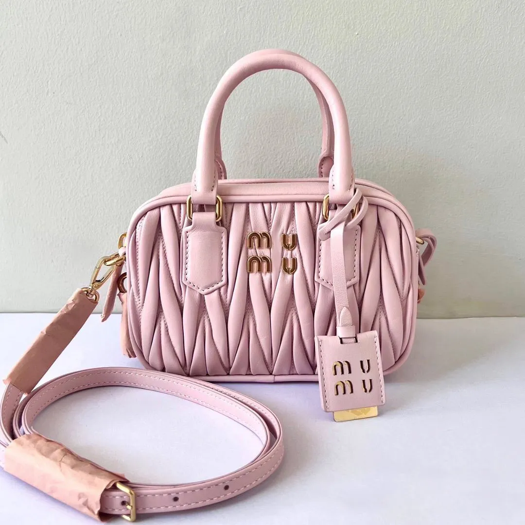 Blush pink designer bag hot sale