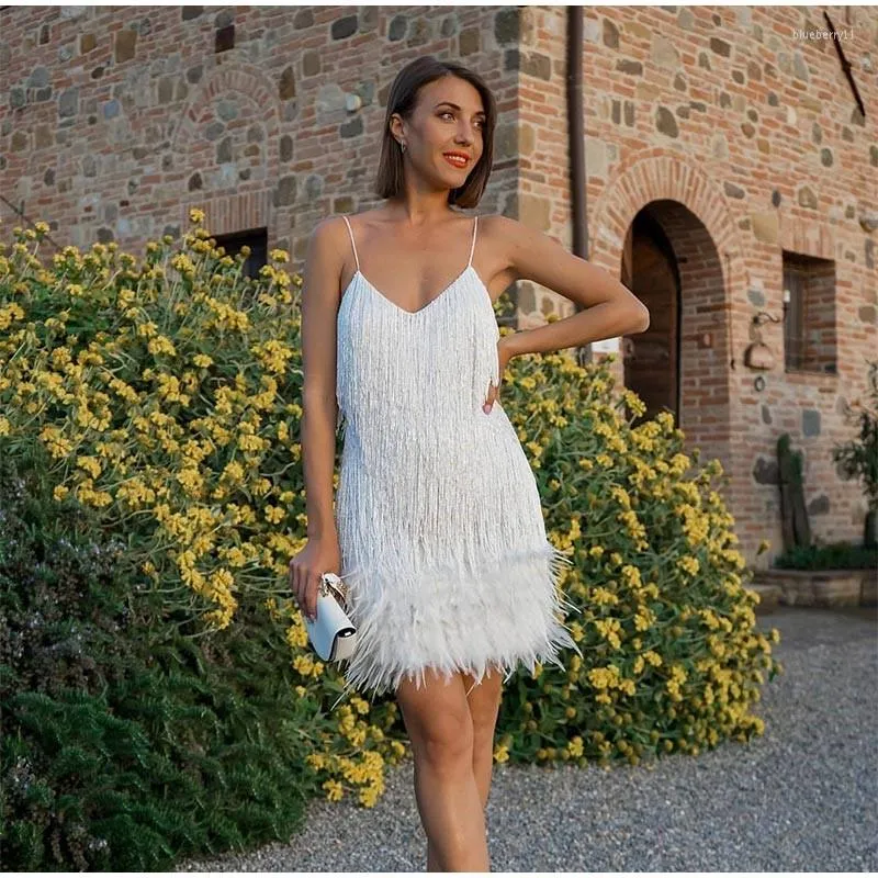 Vestido blanco plumas on sale