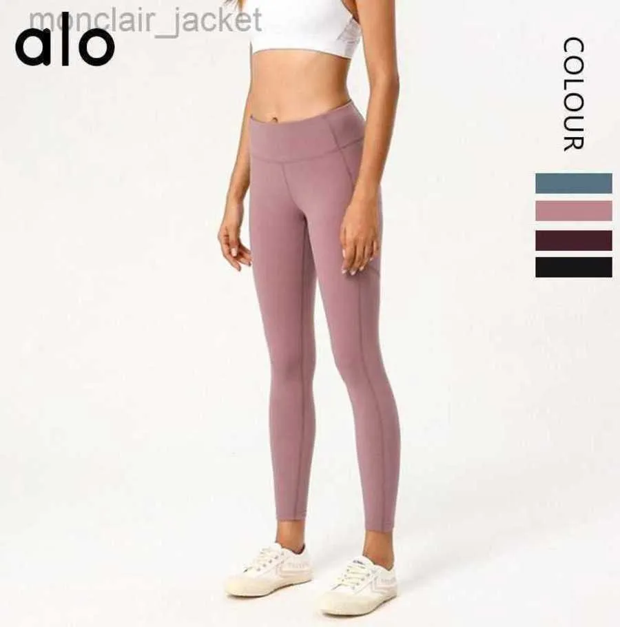 Desginer Yoga Leggings Samma byxor 2020 Naken Känsla av byxbältesfickan Kvinnor som bär hög midja och höftlyft sommar