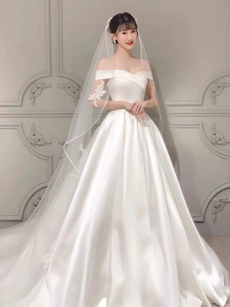2025 élégante qualité de perles à la main super off épaule avec des perles faites à la main toute la robe avec de la dentelle de luxe et robe de mariée avec des manches belle robe