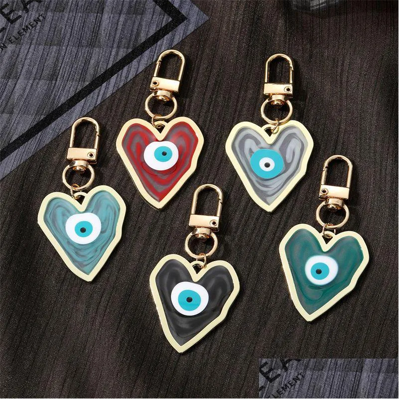 Principais anéis que florescem coração Evil Eye Cabine para amantes de amantes Presente de resina de bolsa de carros de keyring de keyring jóias de entrega de gotas dhgarden dh3tk