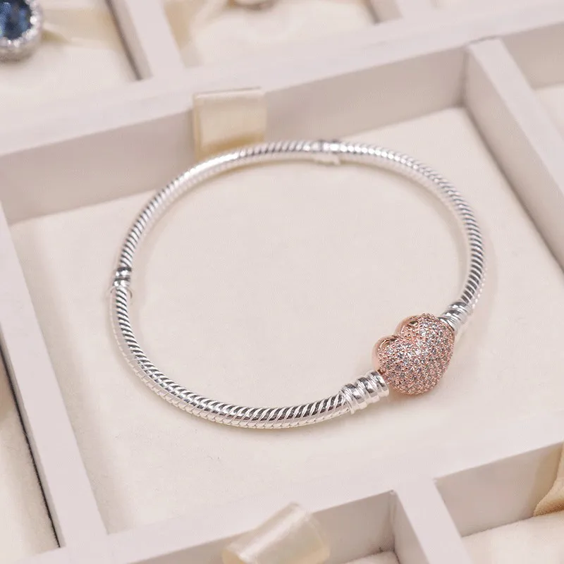Moments silver bracelet with pavé heart clasp deals