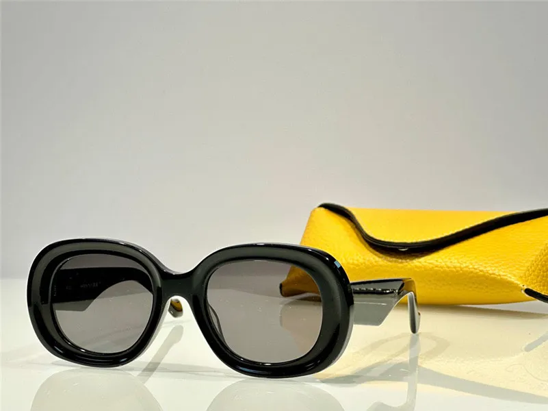 تصميم جديد للأزياء نظارة شمسية بيضاوية أسيتات مع جنسي في نهاية الذهب على المعابد الشعبية شعبية النمط البسيط UV400 نظارات 40103U