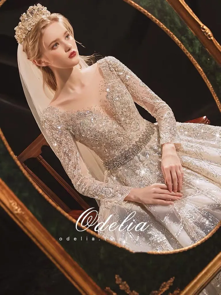 Wedding Dress Backless V Neck Crystal Beading Long Sleeves A Line Sweep  Train Tulle from Dhgate Ball Gown Wedding Dresses - price 175.49