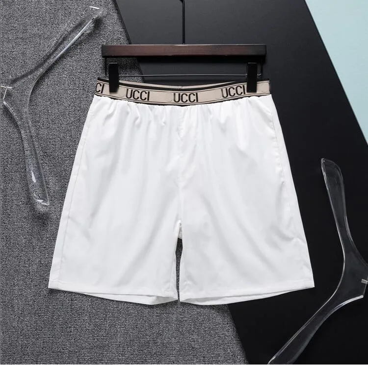 New Summer Essentials Cotton Fashion Casual Pantaloncini da uomo larghi Pantaloni da allenamento per il fitness Shopping da viaggio Pantalone a cinque punte Pantaloncini da nuoto Pantaloncini rhude # shopee # 001