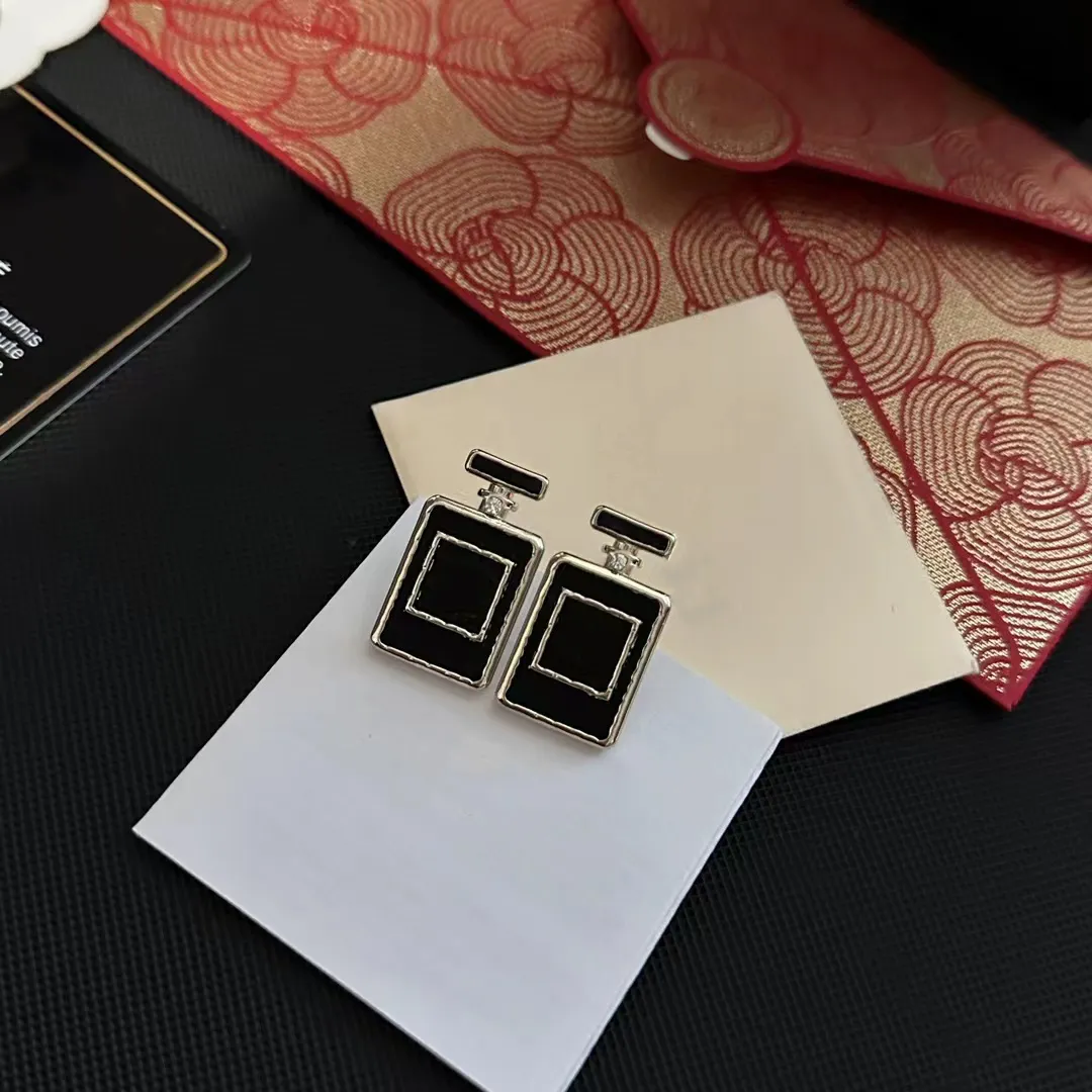 fashion brass perfume bottle accessories Chandelier Earrings c symbol Earrings With paper card