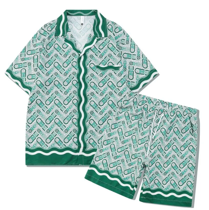 メンズトラックスーツ2023夏の新しいプリントシャツメンズセットカジュアルショーツ半袖メンズ2ピースビーチパンツ