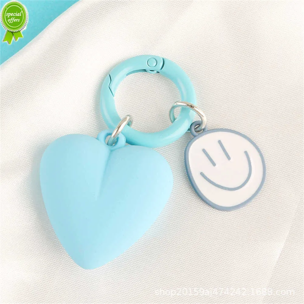 Ny Macaroon Peach Heart Keychain Söt oregelbundet leende ansikte hänge för kvinnor flickor Bag biltillbehör Kreativa DIY -gåvor