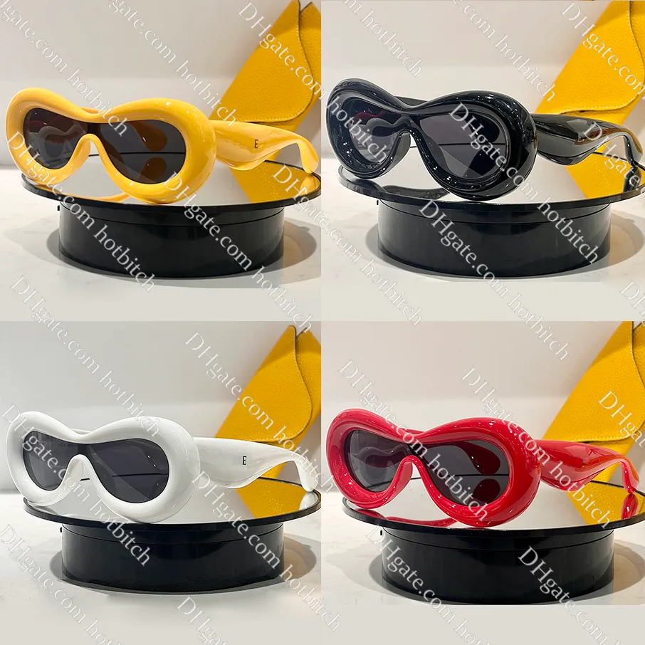 Occhiali da sole di plastica gialli firmati per le donne Occhiali da sole gonfiabili Cat Eye da uomo Occhiali da sole da esterno Occhiali da guida sportivi alla moda