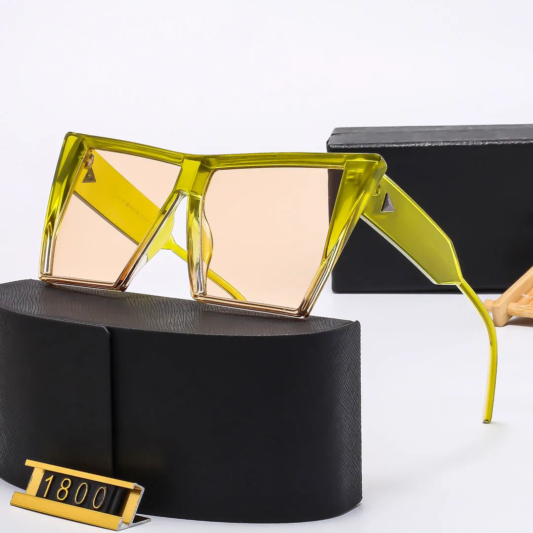 Men Dames Designer Zonnebril Mode klassieke bril bril Goggle Outdoor Strand Zonneglazen voor man Woman UV400 driehoekige handtekening met doos