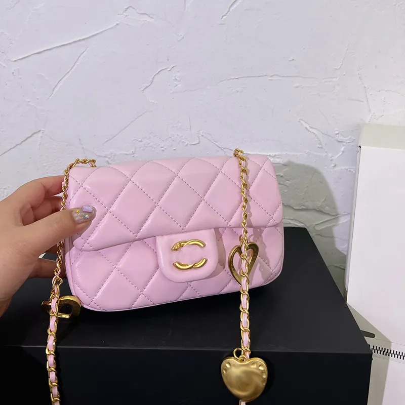 DHgate.com:Classic Sheepskin Mini Shoulder Bag with Gold Hardware: Soft ...
