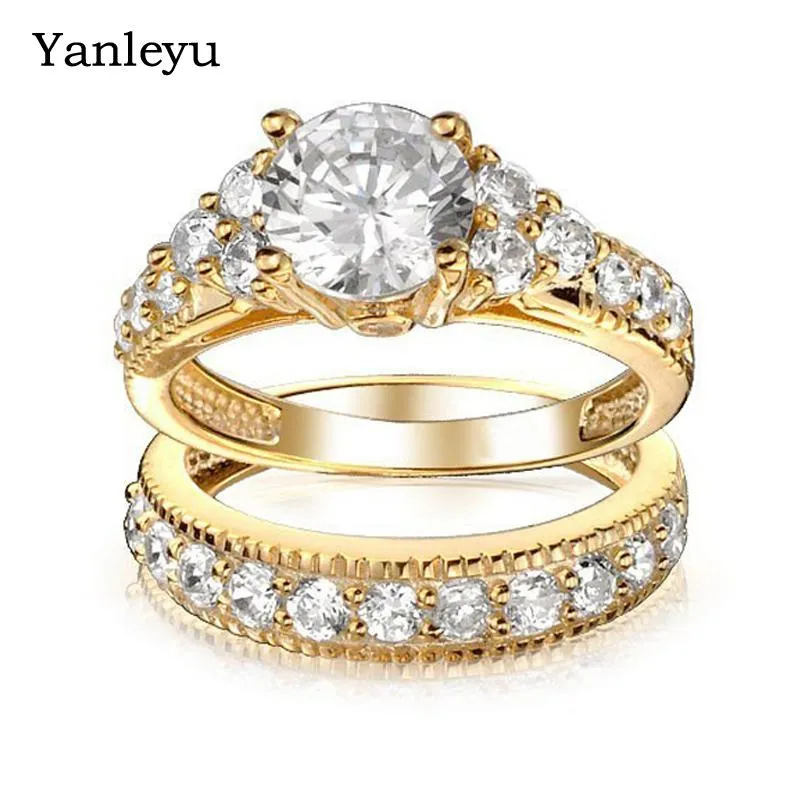 Ringar Yanleyu Luxury 2st 18K Gold Color Bridal Engagement Ring sätter högklassiga kubiska zirkoniumbröllopsmycken för kvinnor PR045