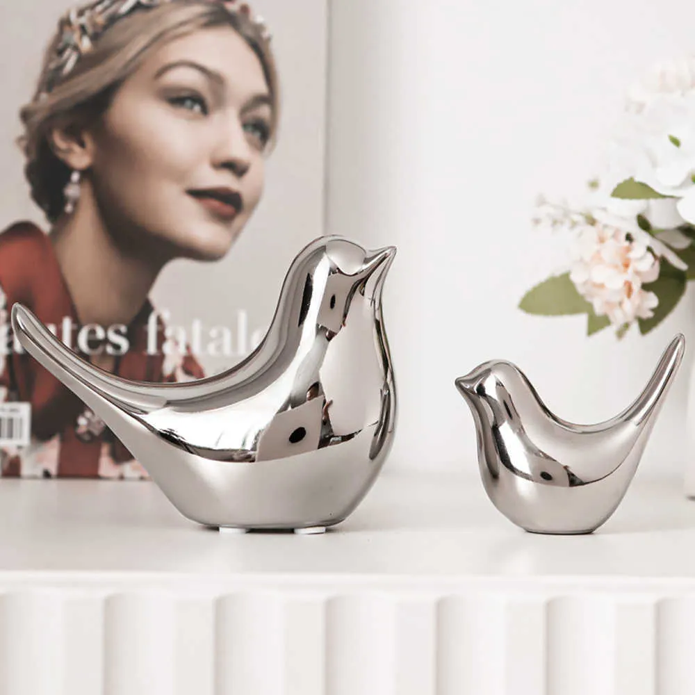 Nieuwe items Modern Simple Luxury Silver Ceramic Bird Figurines Home Decoratie Accessoires Golden Bird Figuren Decoratieve bruiloft ornamenten G230520