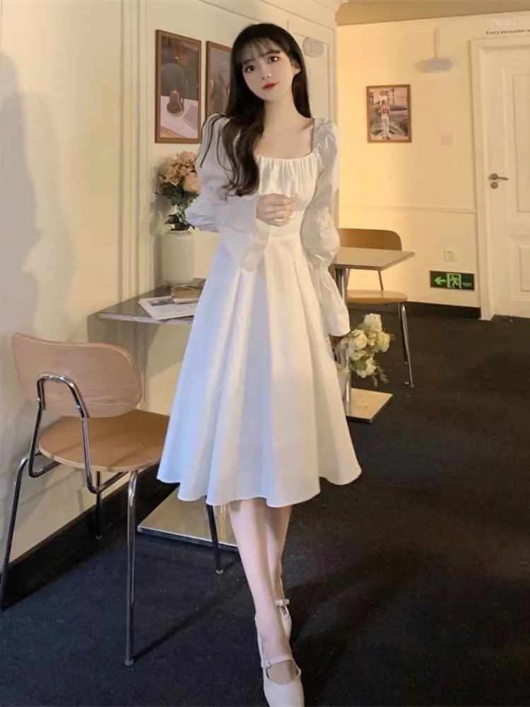 Mid length white dress discount