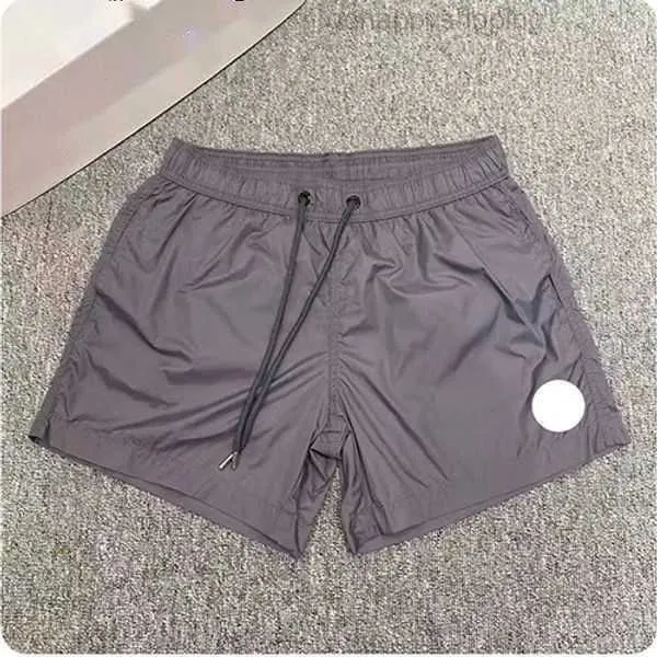 Pantaloncini firmati Costumi da bagno da uomo Pantaloncini da spiaggia da donna Luxury Etichetta ricamata impermeabile Asciugatura rapida con pantaloni sportivi da yoga traspiranti in rete Estate 9s1