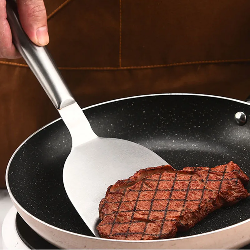 Video su Qual è 19-Piece Nuovo set di utensili da cucina in silicone con manico in legno, tagliere e set di gadget con secchio di stoccaggio