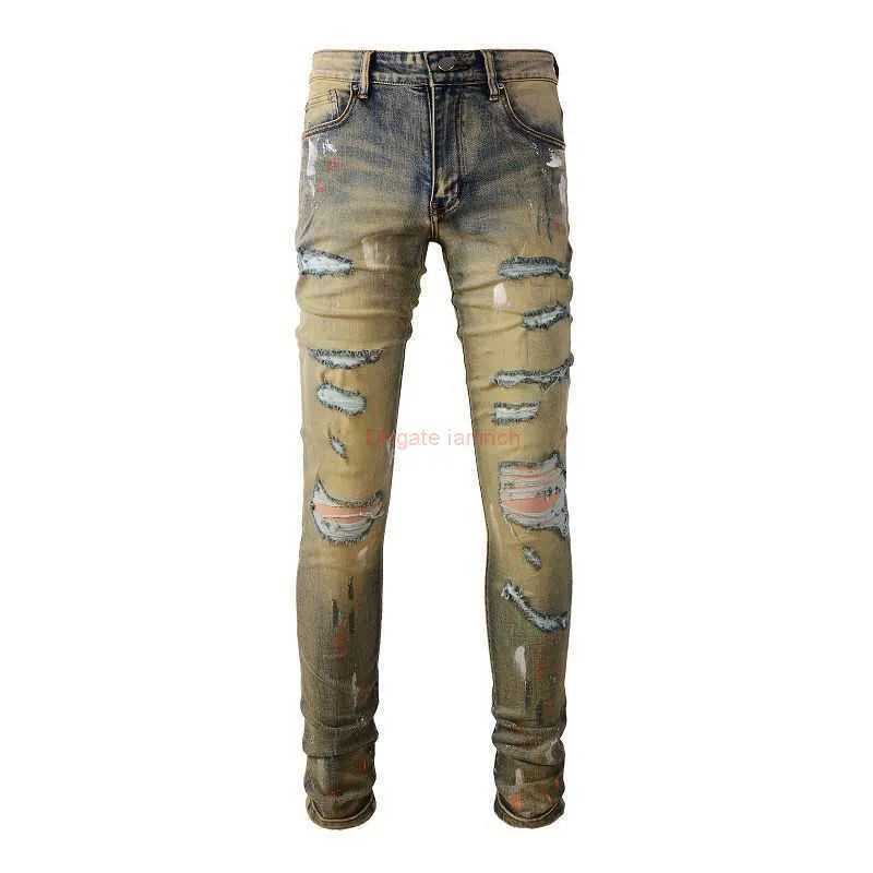 Tan ripped jeans online