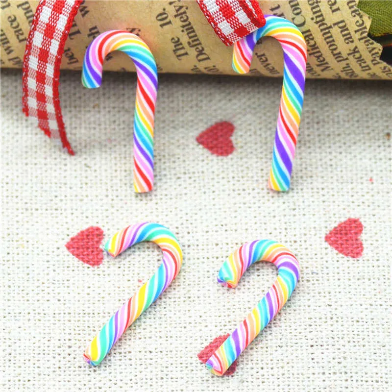 Artículos novedosos 50 UNIDS Venta al por mayor 10 mm X 30 mm Arcilla de polímero de arco iris Muleta de caramelo Miniaturas Artesanía de Navidad Adornos Decoración de fiesta G230520