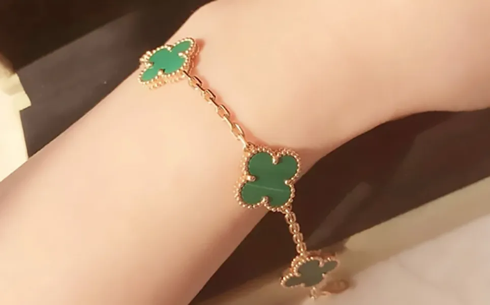 Four leaf clover bracelet designer top