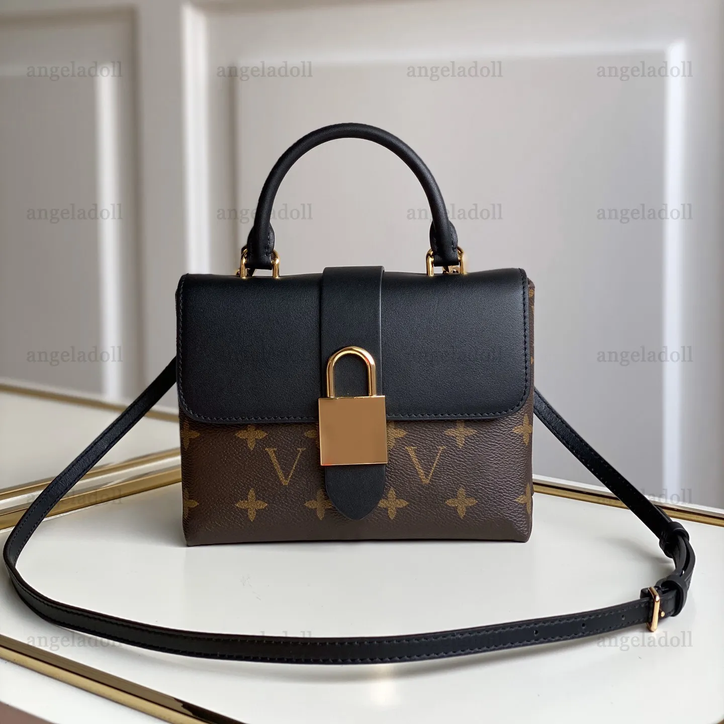 10A spegel Kvalitet Designers liten låsväska 21 cm brun belagd canvas Pochette-väska för kvinnor Lyxig kohudshandtag handväska Crossbody-axelremsväska