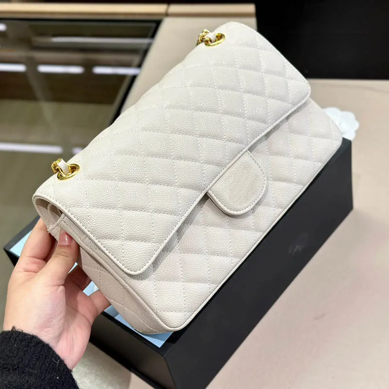 White designer clutch bag top
