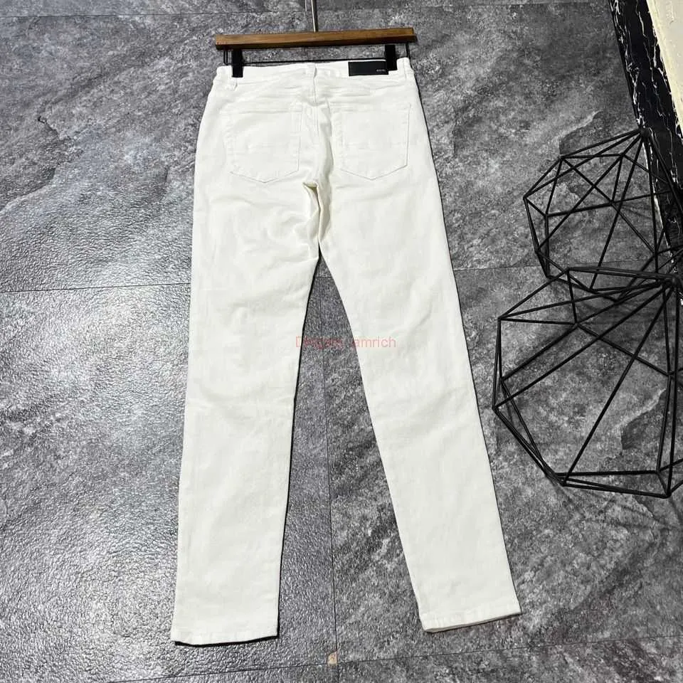 Jean blanc a trou hot sale